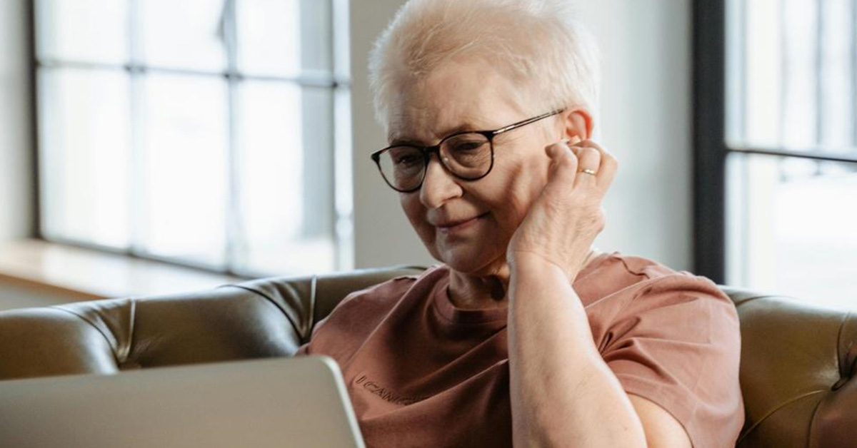 family looking at photo album together