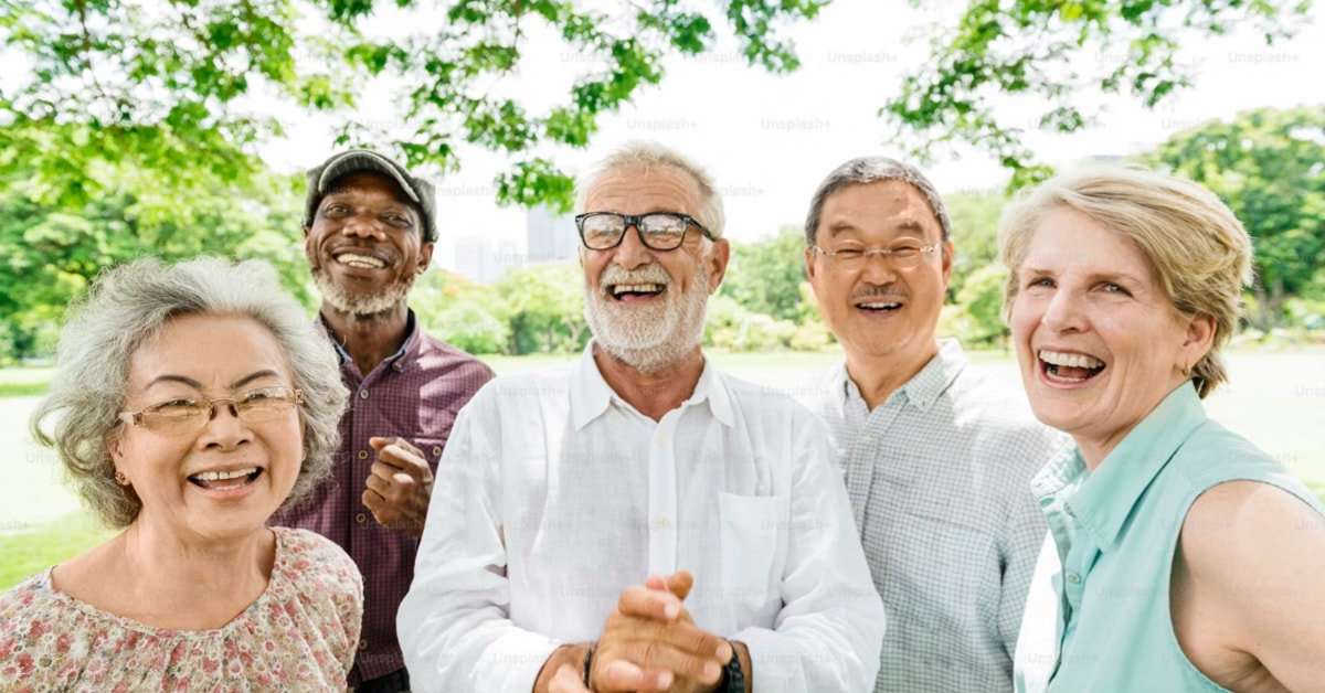 happy smiling seniors in group