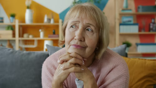 woman lost in contemplative thought
