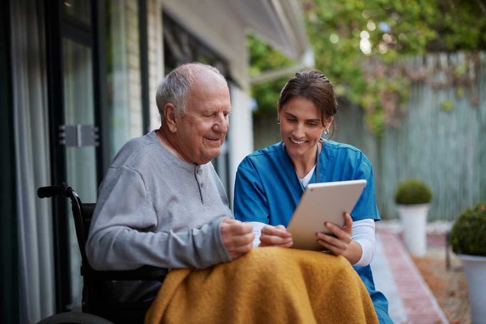 senior using a tablet